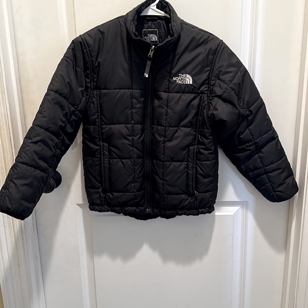 The North Face puffer jacket.  Kids size M